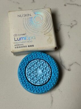 NuSkin LumiSpa treatment head.